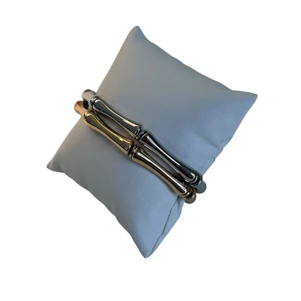 Set of Bamboo Style Stretch Bracelets. One in Gold Tone, One in Silver Tone.